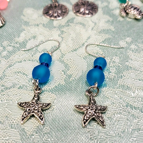 J & R Gems & Jewelry. Jewelry - Twisted Sterling Starfish Earrings!